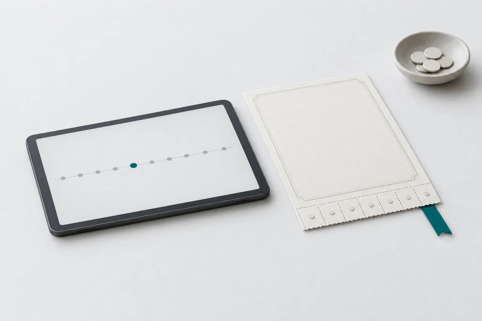 A matte graphite tablet with an abstract line of evenly spaced coupon dots and a single bond certificate with a tear-off coupon strip and a turquoise bookmark on a light desk